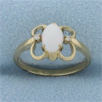 Opal and Diamond Ring in 10k Yellow Gold
