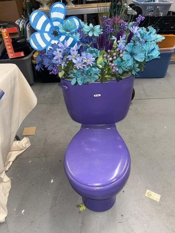 Purple toilet flower pot with purple and blue