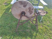 Seated Antique Grindstone