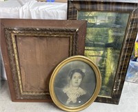 oval framed photo, ornate page frame, and