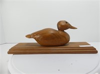 SIGNED WOOD CARVED DUCK ON BASE