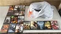 Trash bag full of dvds (some may not have discs)