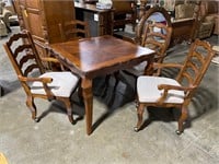 Table and 4 - chairs with casters