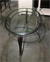 Very nice sturdy iron oval coffee table with a
