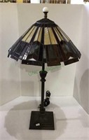 Beautiful stained glass-like lamp on pencil style