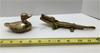 Lot includes a brass duck figurine and brass