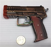 Butane lighter replicating a handgun.    290
