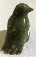 Carved bird out of what appears to be a marble