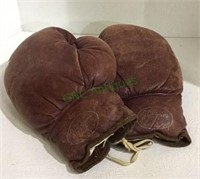 Vintage pair of JC Higgins boxing gloves.  1733