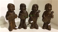 Carved wooden figures with long hair with musical