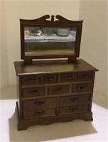 Wooden vintage jewelry box replicating a dresser