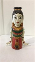 Asian hand carved puppeteer functions with string