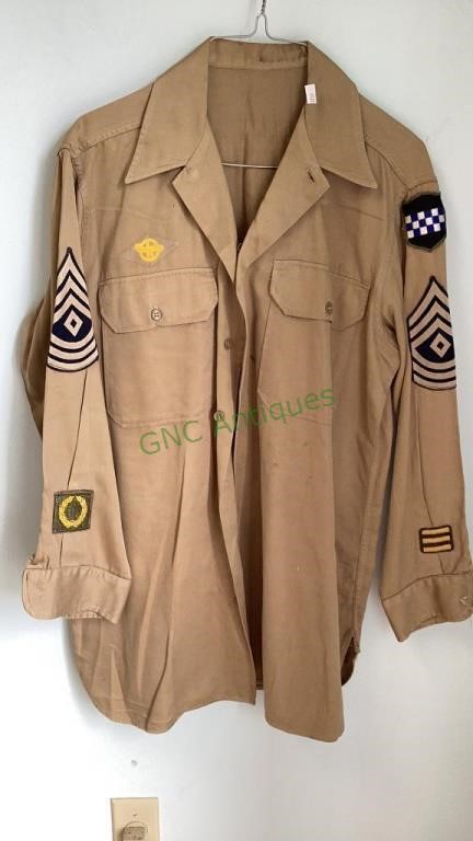 Vintage first sergeant blouse with unit insignia.