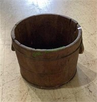 Antique barrel bottom with two iron rings and two