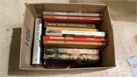 Box of books includes Cooking Life, cookbook,