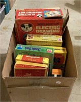 Box of vintage games and puzzles includes Donald