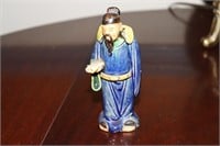 Chinese mudman scholar figurine possibly circa