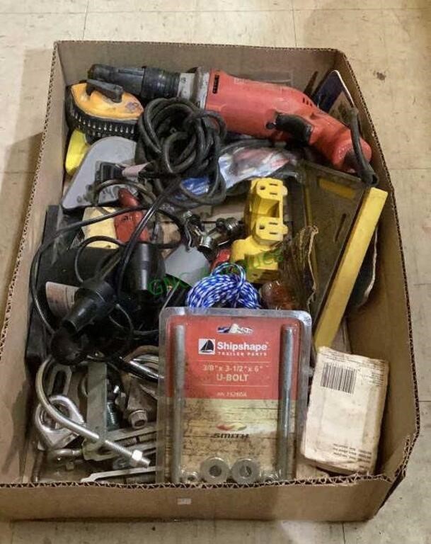 Box with miscellaneous tools inside includes a