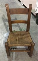 Childs antique oak rocking chair with woven seat -