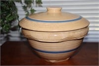 Yellow ware lidded pottery bowl with blue stripe