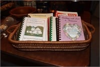Collection of cookbooks in a wicker basket