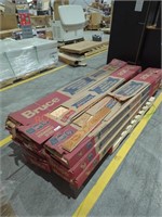 9 boxes of Bruce flooring different colors
