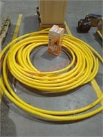 Roll of yellow PEX piping unknown amount