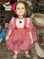 DOLL IN RED AND WHITE OUTFIT