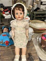 DOLL IN WHITE AND GREEN DRESS