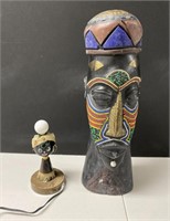 Small lamp and wood figurine