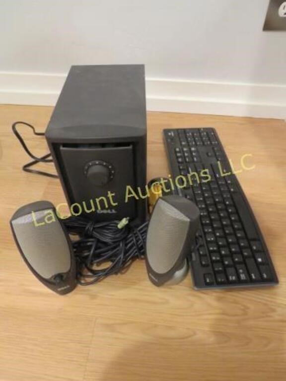 Dell Speakers subwoofer and a keyboard