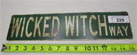 Wicked Witch Way Metal Sign