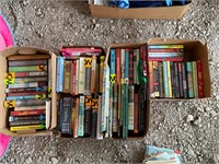 Boxes of books, kids and hardbacks