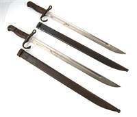 Two WWII Japanese bayonets with sheaths