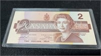 Uncirculated 1986 Canadian Two Dollar Bill In Hard
