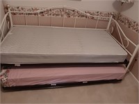 Daybed with pop-up trendle and 2 mattresses.
