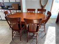 antique wooden table and chairs