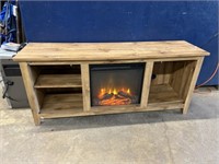 TV STAND W/FIREPLACE-TOP HAS SOME MARKS