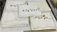9 Pillow cases-some embroidered