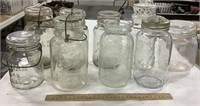 9 glass jars - 5 w/ glass lids