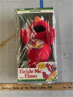 NOS tickle me Elmo tyco