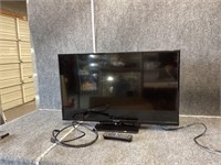 Panasonic TV with Cables and Remote