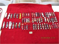 GROUP OF 57 USED POCKET KNIVES WITH CARRYING CASE