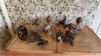 Five antique oil lamps with three antique iron