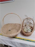 2 wicker baskets with stuffed bunnies