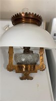 Antique hanging oil lamp that has been