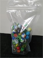 Bag full of miscellaneous marbles