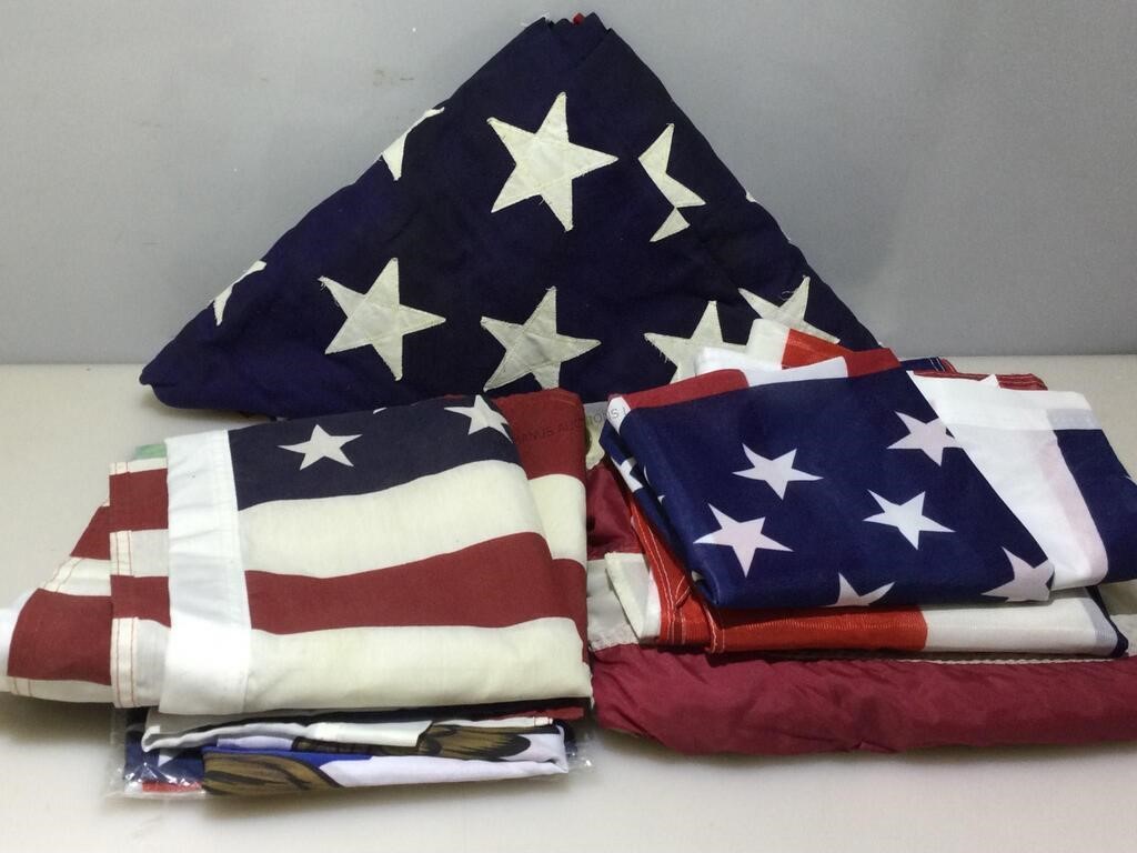 Collection of USA flags. Assorted sizes.