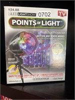 LED light show in box- not new    (living room)