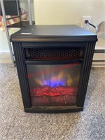 Wheeled space Heater  - works  (living room)